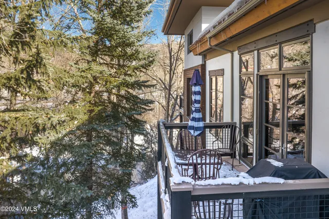 a view of a street with cars