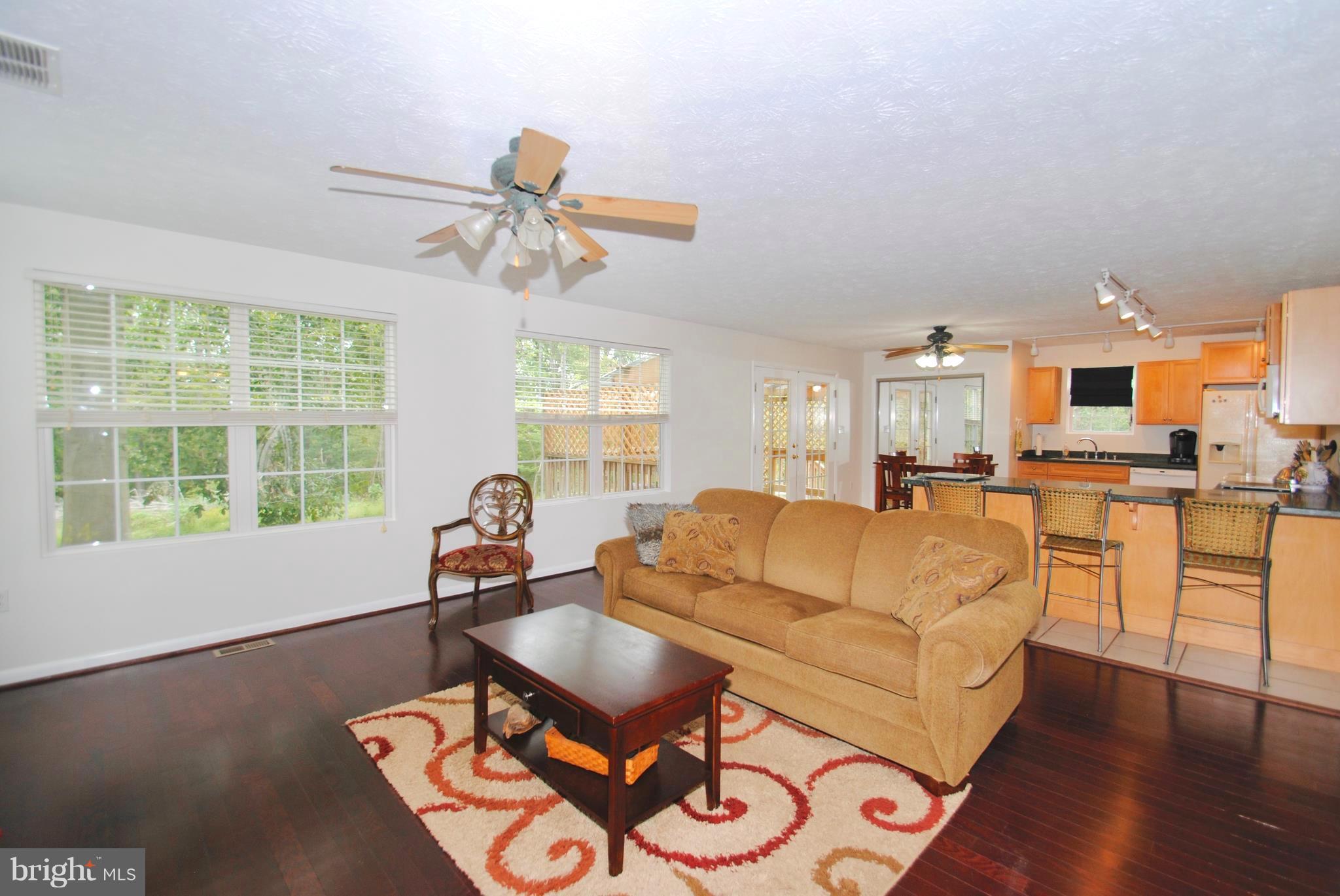 302 Fairhaven Road Tracys Landing, MD 20779 - Photo 5 of 24 a living room with furniture and a large window
