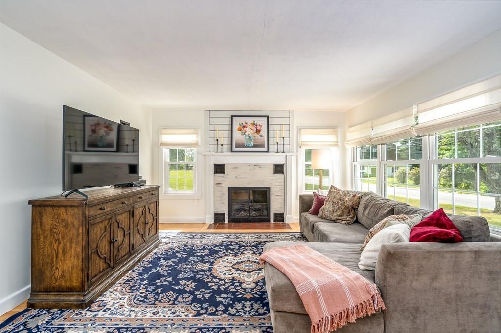 4 Fomer Road Southampton, MA 01073 - Photo 15 of 42 a living room with furniture flat screen tv and a fireplace