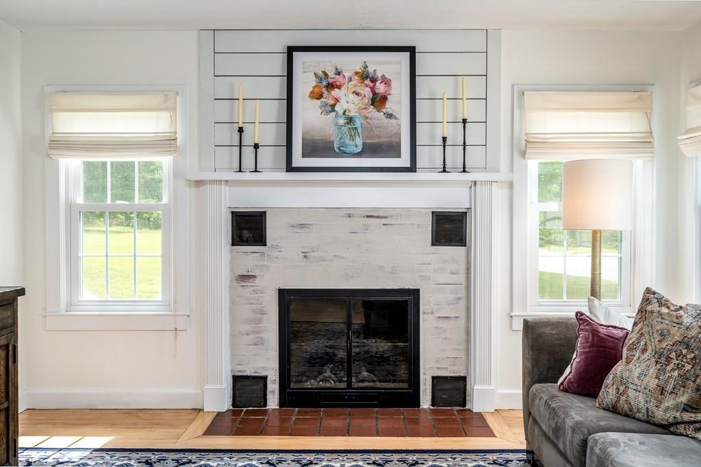 4 Fomer Road Southampton, MA 01073 - Photo 18 of 42 a living room with furniture a fireplace and a window
