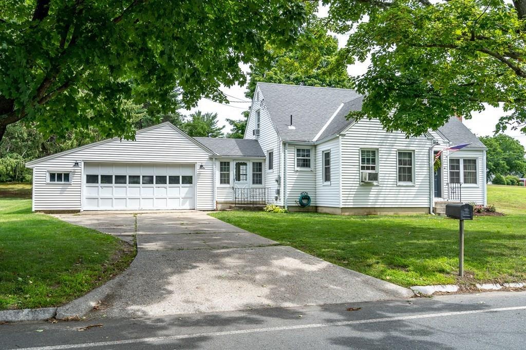 4 Fomer Road Southampton, MA 01073 - Photo 3 of 42 a view of a house with a yard and large trees
