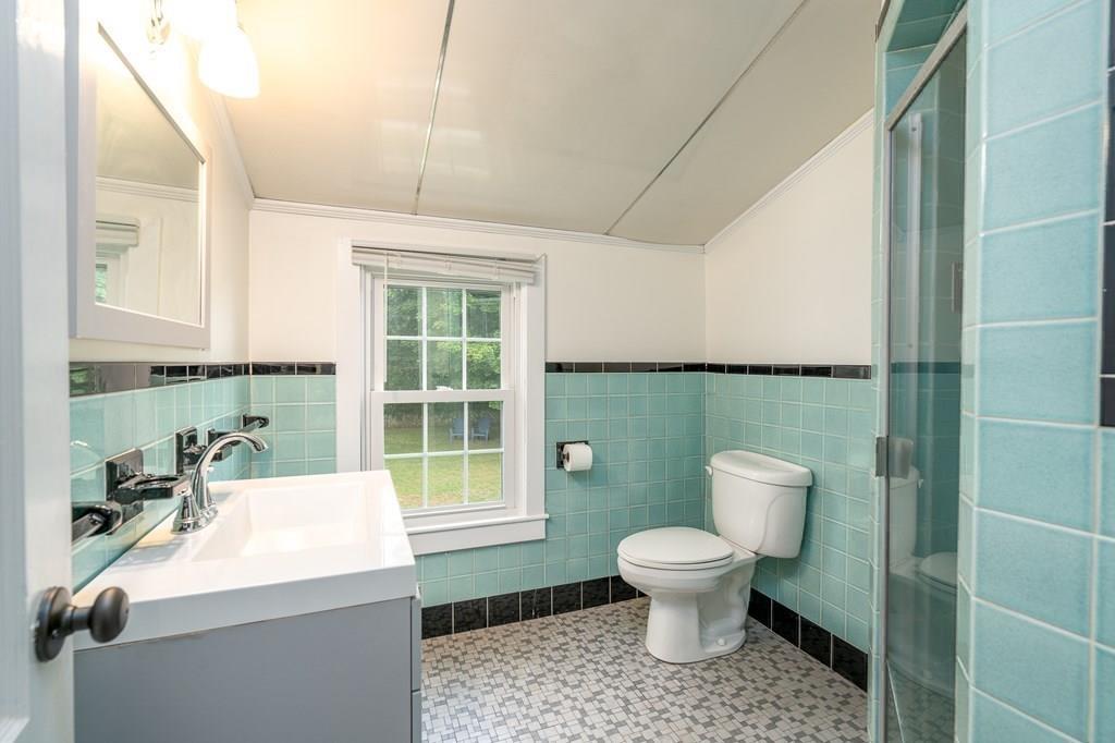 4 Fomer Road Southampton, MA 01073 - Photo 32 of 42 a bathroom with a toilet sink and mirror