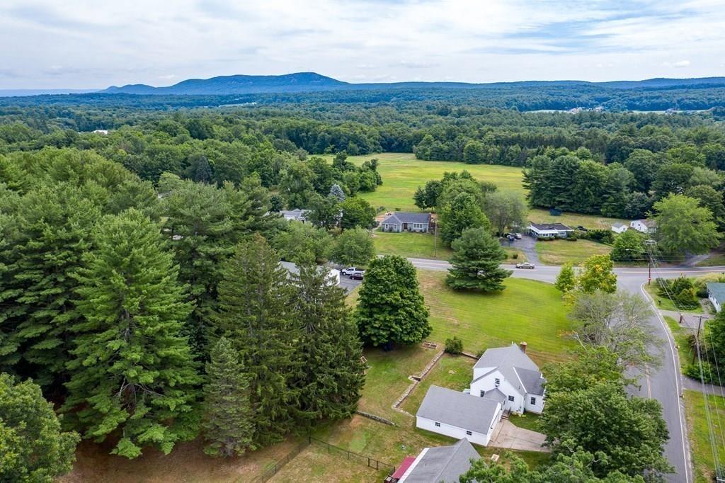 4 Fomer Road Southampton, MA 01073 - Photo 40 of 42 an aerial view of green landscape with trees houses and mountain view