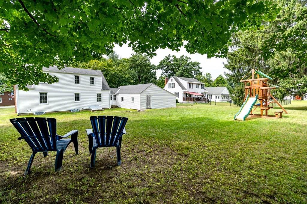 4 Fomer Road Southampton, MA 01073 - Photo 8 of 42 a backyard of a house with table and chairs
