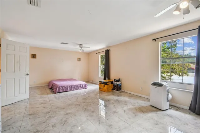 a bathroom with a glass door shower