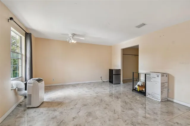 a view of a room with racks on the wall