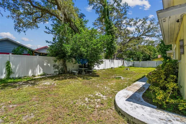 a view of swimming pool with an outdoor space and seating area