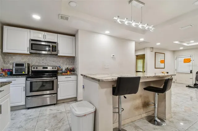 a bedroom with a bed and a closet