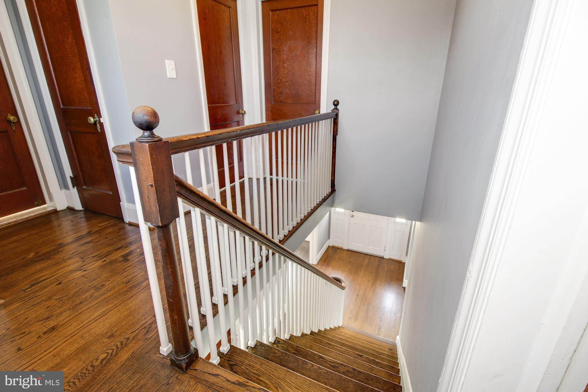 534 Forest View Road Linthicum Heights, MD 21090 - Photo 11 of 28 Beautiful staircase & wood floors everywhere