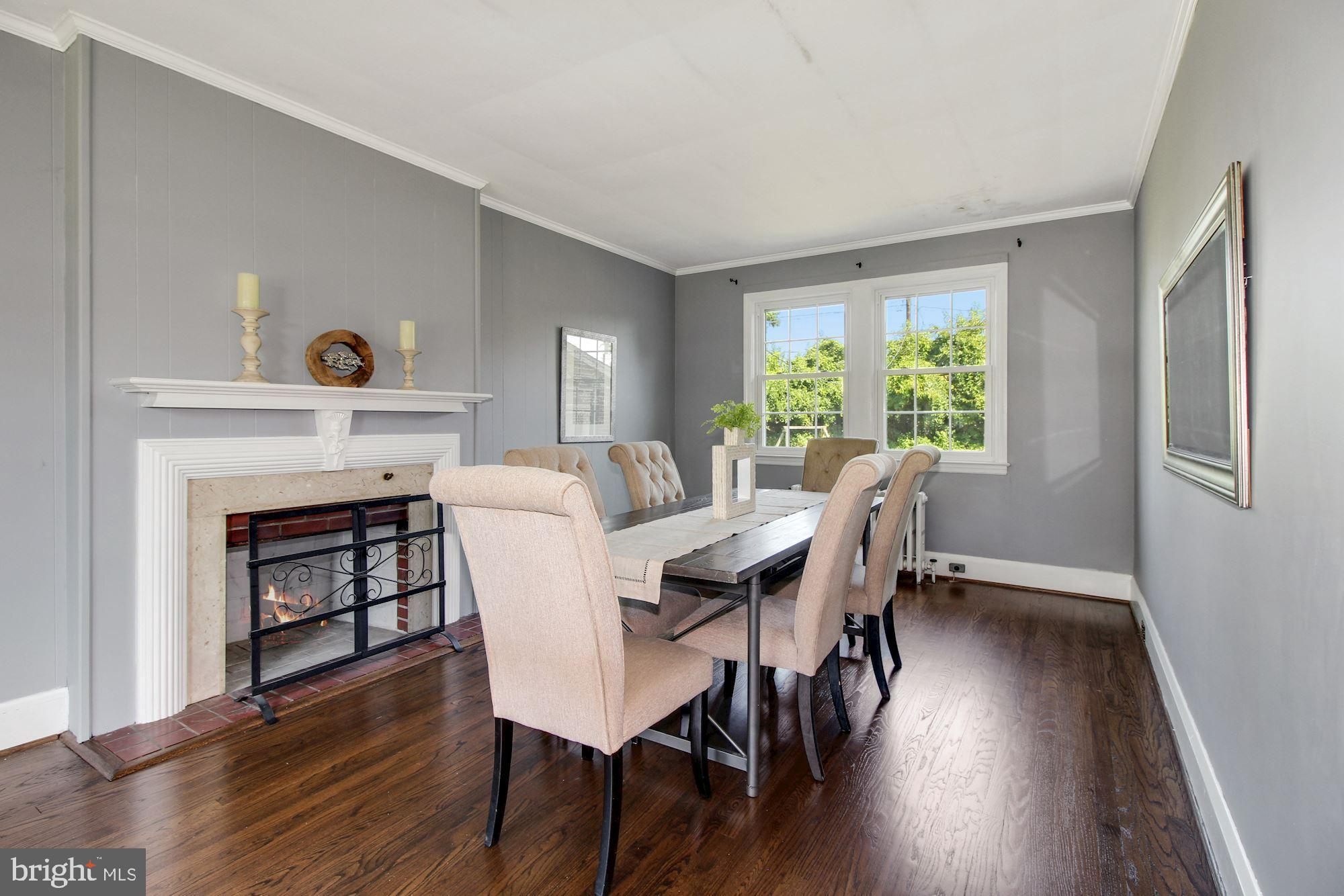 534 Forest View Road Linthicum Heights, MD 21090 - Photo 7 of 28 Formal dining room with wood burning fireplace