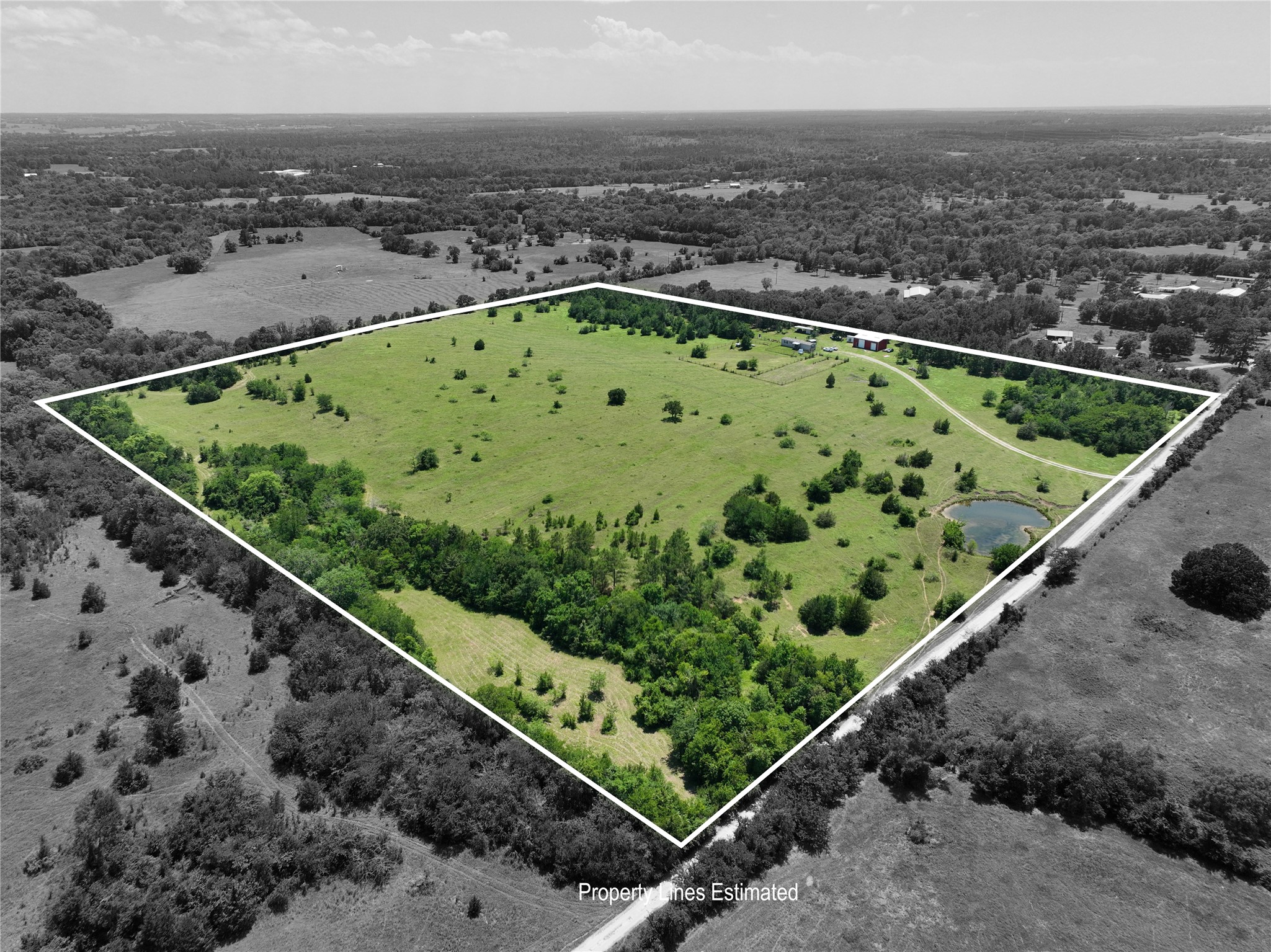 a view of a pool with a yard