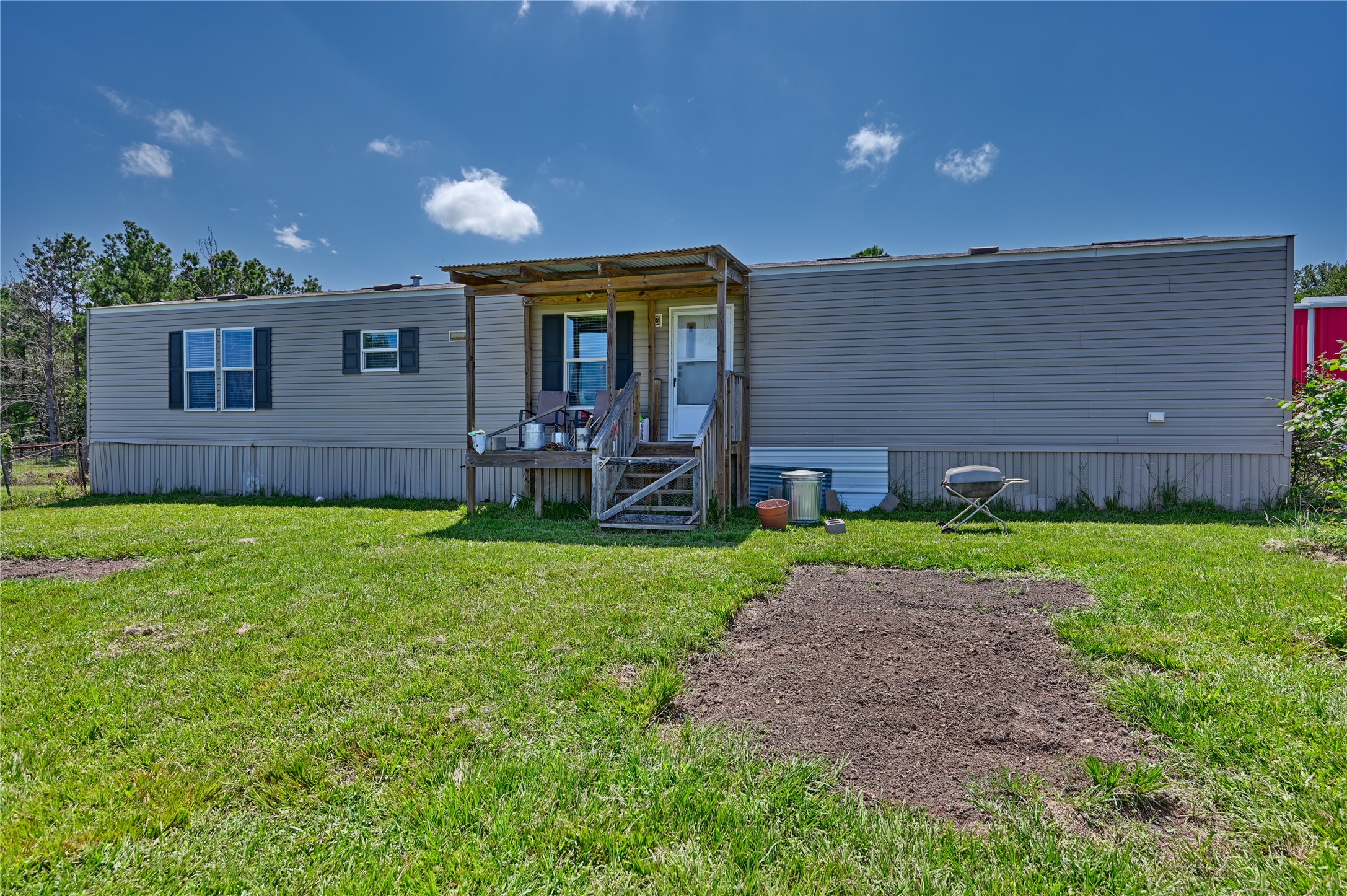 2974 County Road 213 Anderson, TX 77830 - Photo 14 of 50 a house view with a garden space
