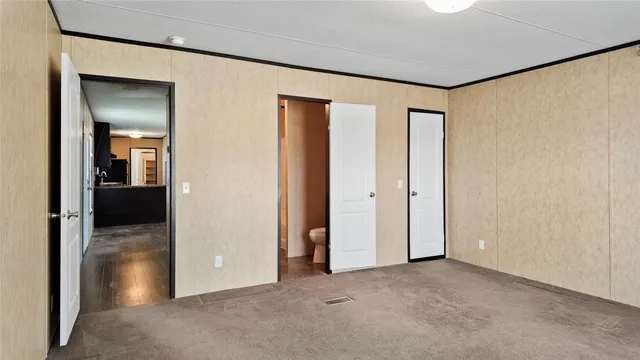 an empty room and closet area