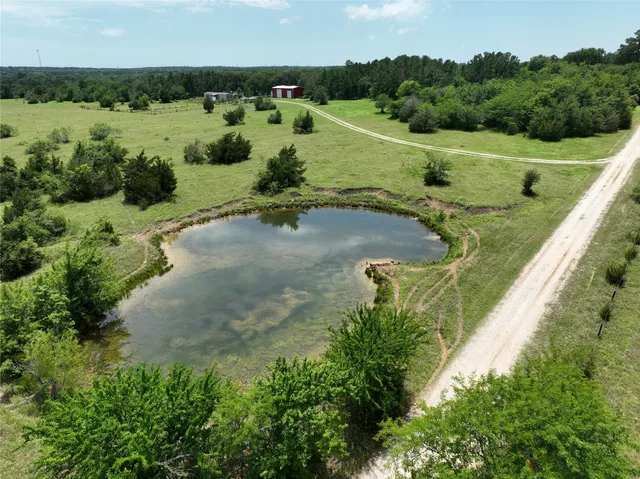 an aerial view of a golf course with a park