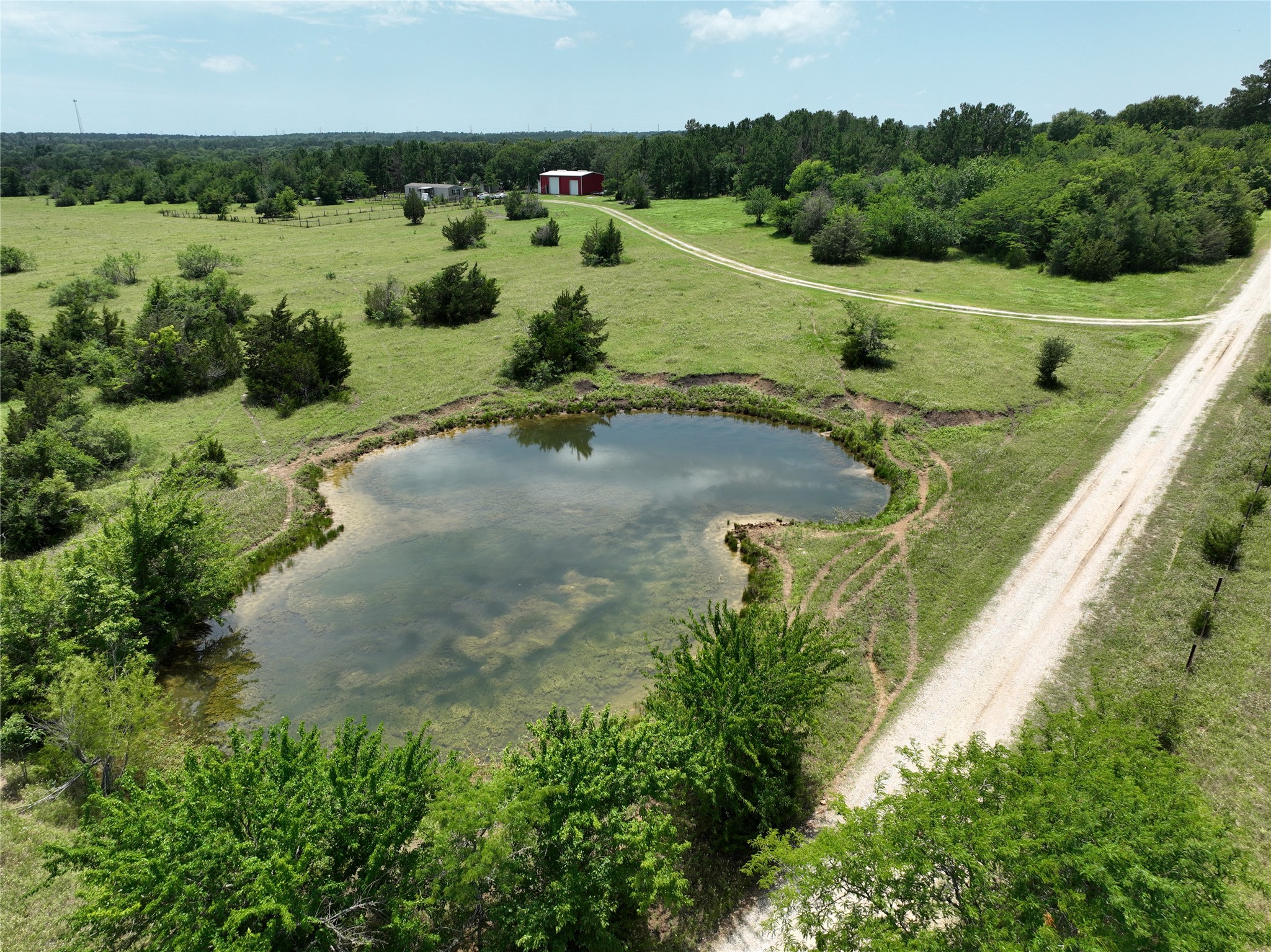 2974 County Road 213 Anderson, TX 77830 - Photo 5 of 50 an aerial view of a golf course with a park