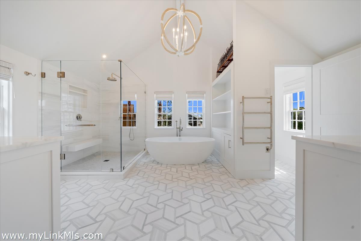 10 North Water Street Nantucket, MA 02554 - Photo 43 of 78 a bathroom with a sink a toilet and shower