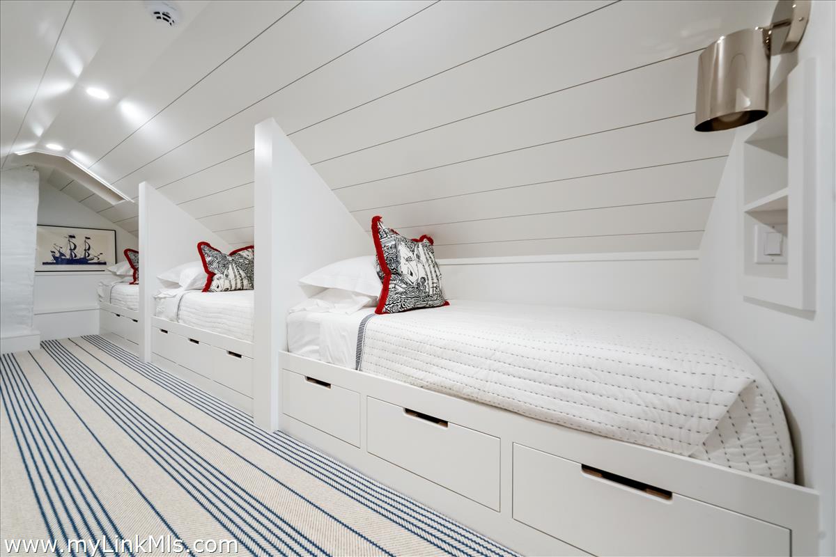 10 North Water Street Nantucket, MA 02554 - Photo 60 of 78 a bedroom with a bed and wooden floor