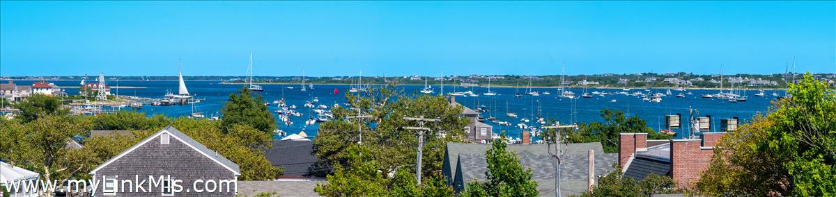 10 North Water Street Nantucket, MA 02554 - Photo 75 of 78 a view of a lake with a house in background