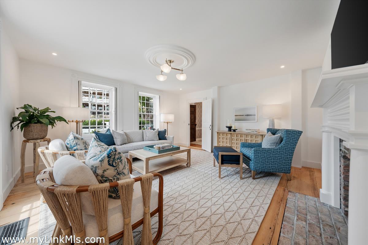 10 North Water Street Nantucket, MA 02554 - Photo 9 of 78 a living room with furniture wooden floor and a flat screen tv