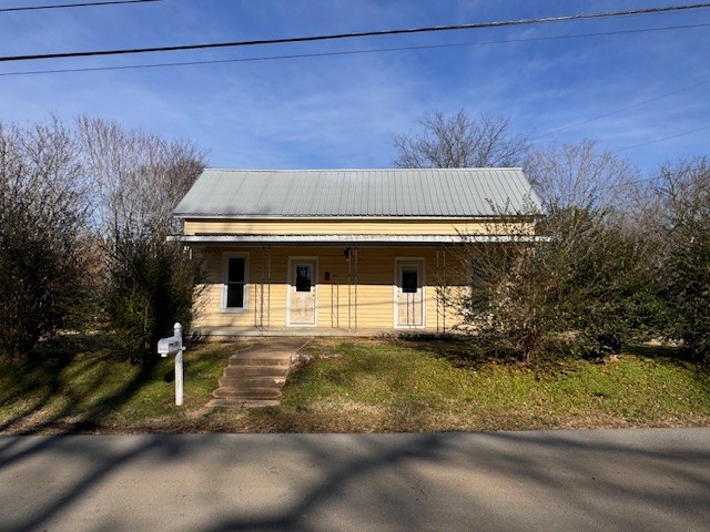 139 Columbia Avenue Centerville, TN 37033 - Photo 14 of 44 a front view of a house with a yard
