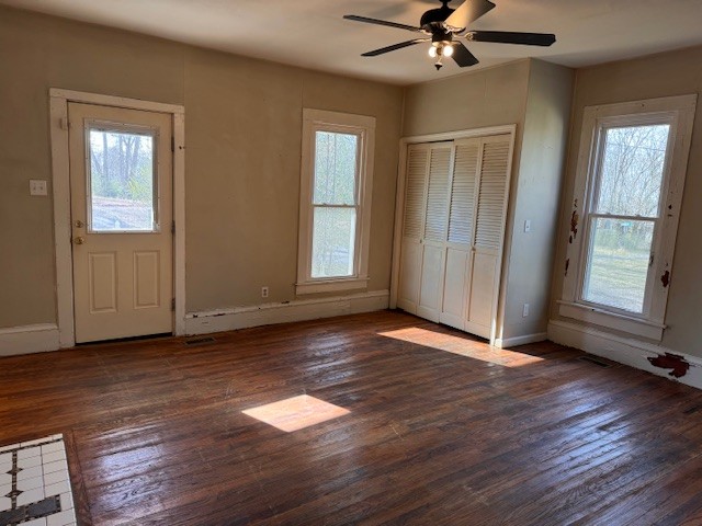 139 Columbia Avenue Centerville, TN 37033 - Photo 25 of 44 an empty room with wooden floor fan and windows