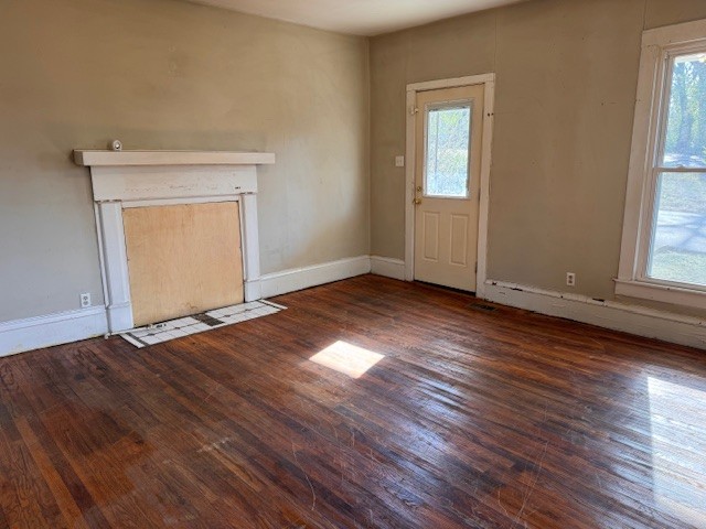 139 Columbia Avenue Centerville, TN 37033 - Photo 26 of 44 an empty room with wooden floor and windows