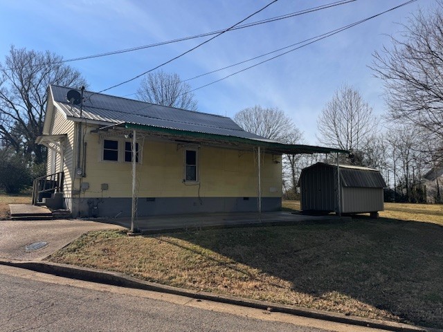 139 Columbia Avenue Centerville, TN 37033 - Photo 43 of 44 a view of a house with a yard