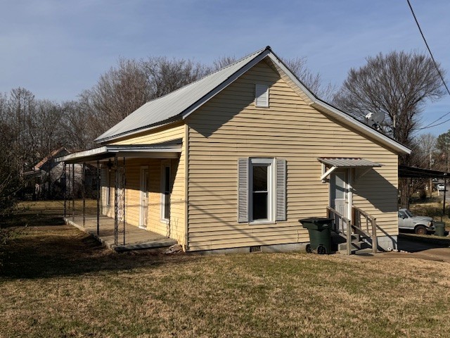 139 Columbia Avenue Centerville, TN 37033 - Photo 44 of 44 a view of a house with a patio