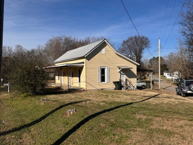 139 Columbia Avenue Centerville, TN 37033 - Photo 5 of 44 a view of a house with backyard
