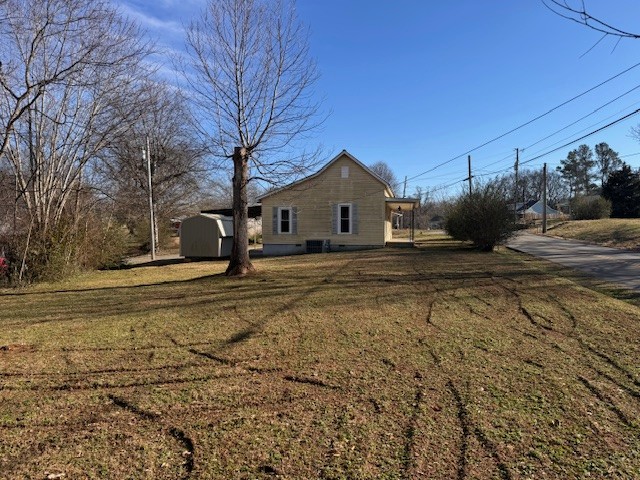 139 Columbia Avenue Centerville, TN 37033 - Photo 9 of 44 a view of a house with a yard