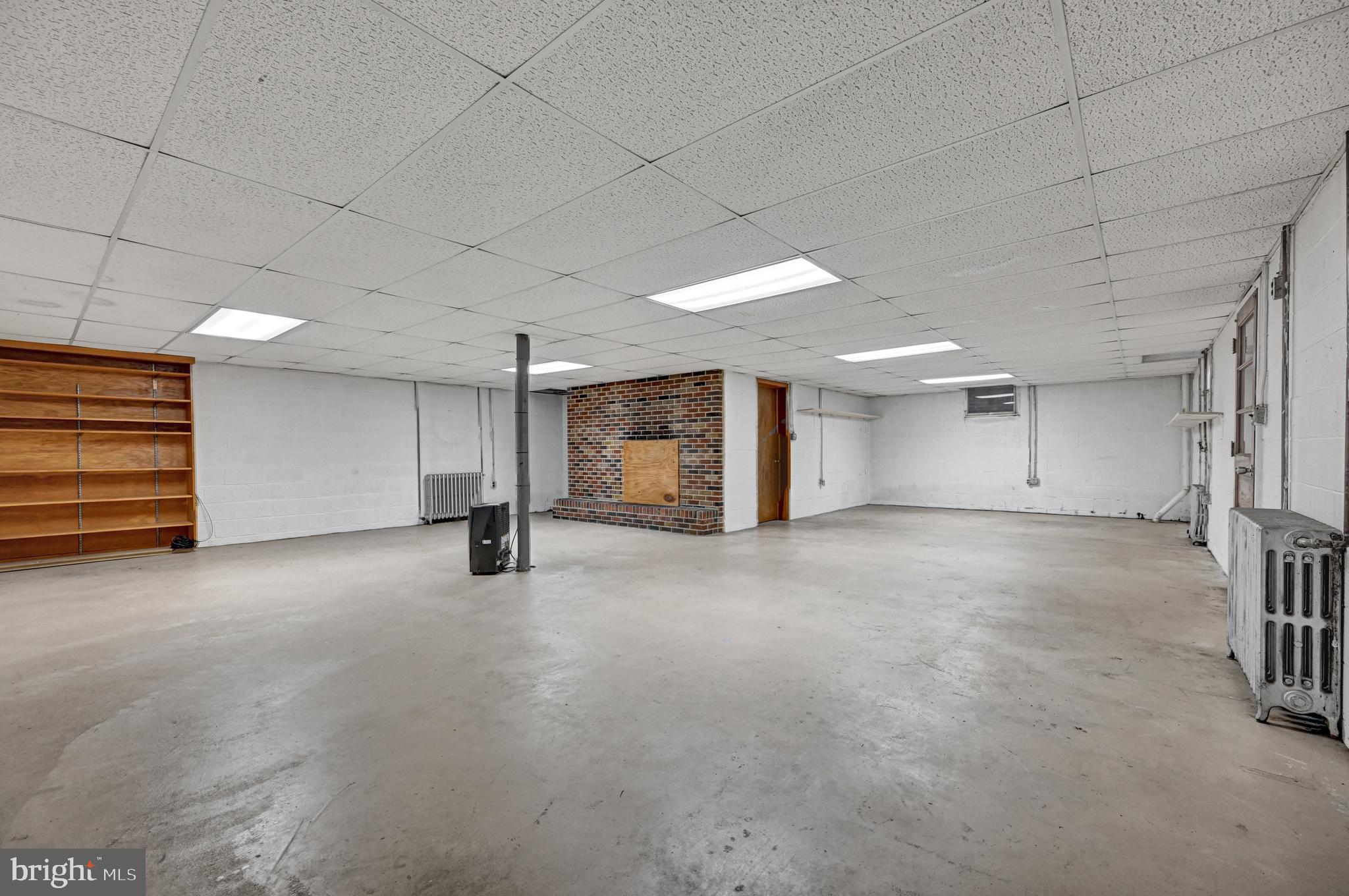 840 Broad Ext Street Delta, PA 17314 - Photo 24 of 27 Full basement w/fireplace.