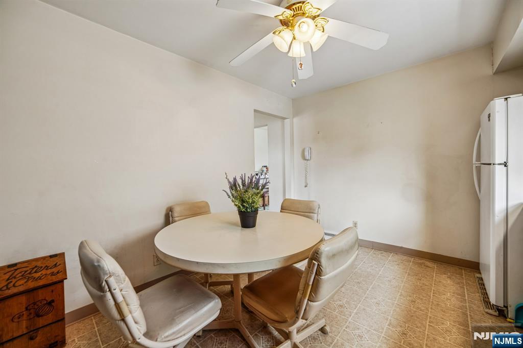 31 Division Street Bloomfield, NJ 07003 - Photo 13 of 30 a view of a dining room with furniture and a chandelier