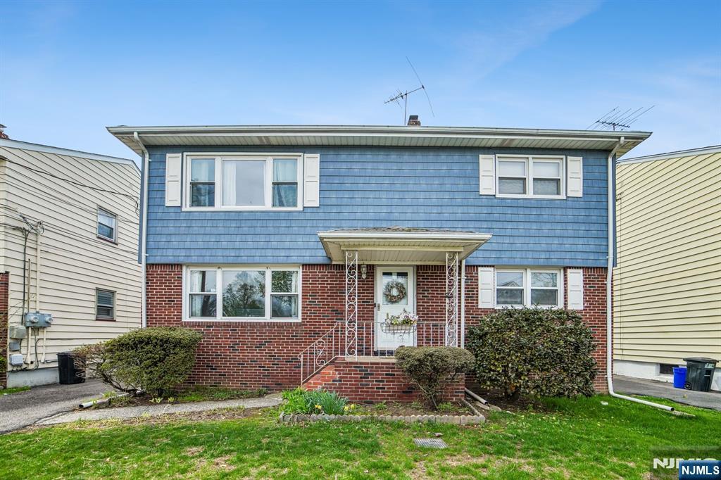 31 Division Street Bloomfield, NJ 07003 - Photo 2 of 30 a front view of a house with garden