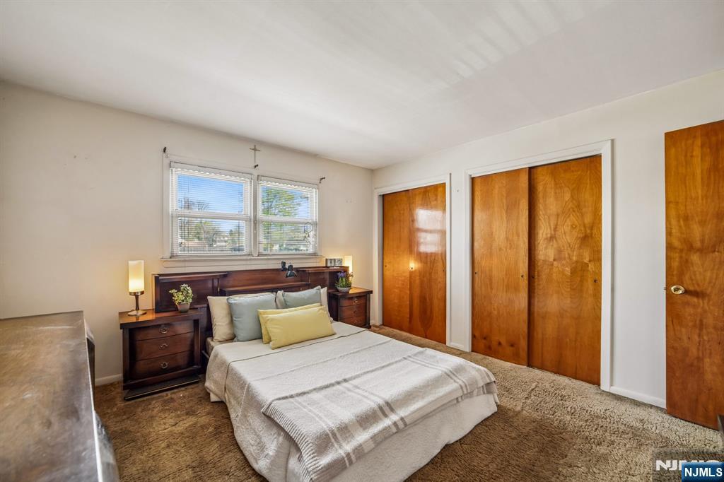 31 Division Street Bloomfield, NJ 07003 - Photo 22 of 30 a bedroom with a bed and a window