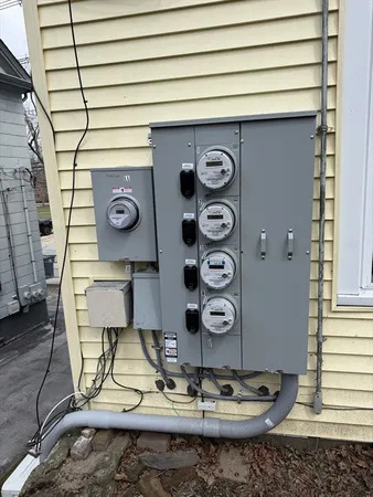 a table with wine bottles and glass on it