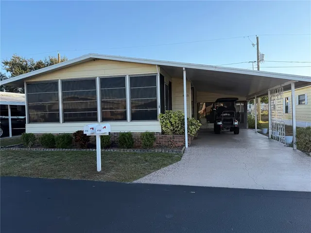 a front view of a house with a porch