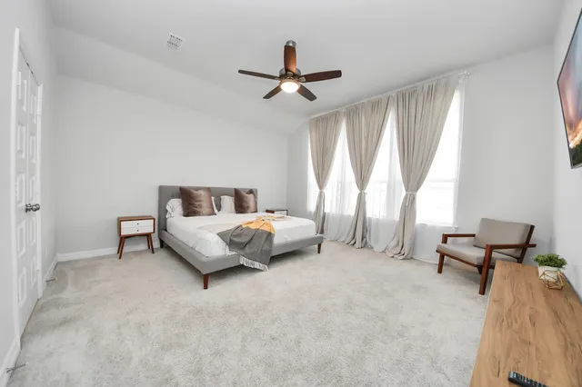 a bathroom with double sink and a mirror