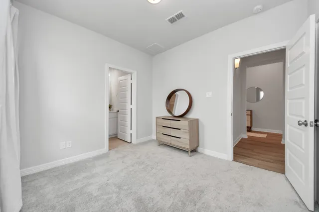 an empty room with a fireplace