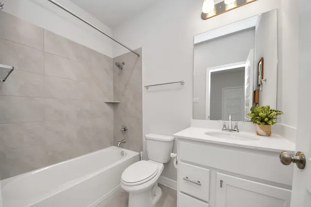 a garden with trees in the background