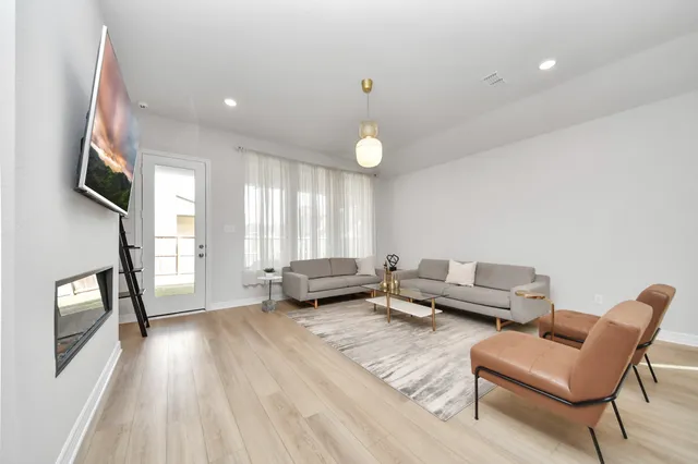 a view of kitchen with dining table and chairs