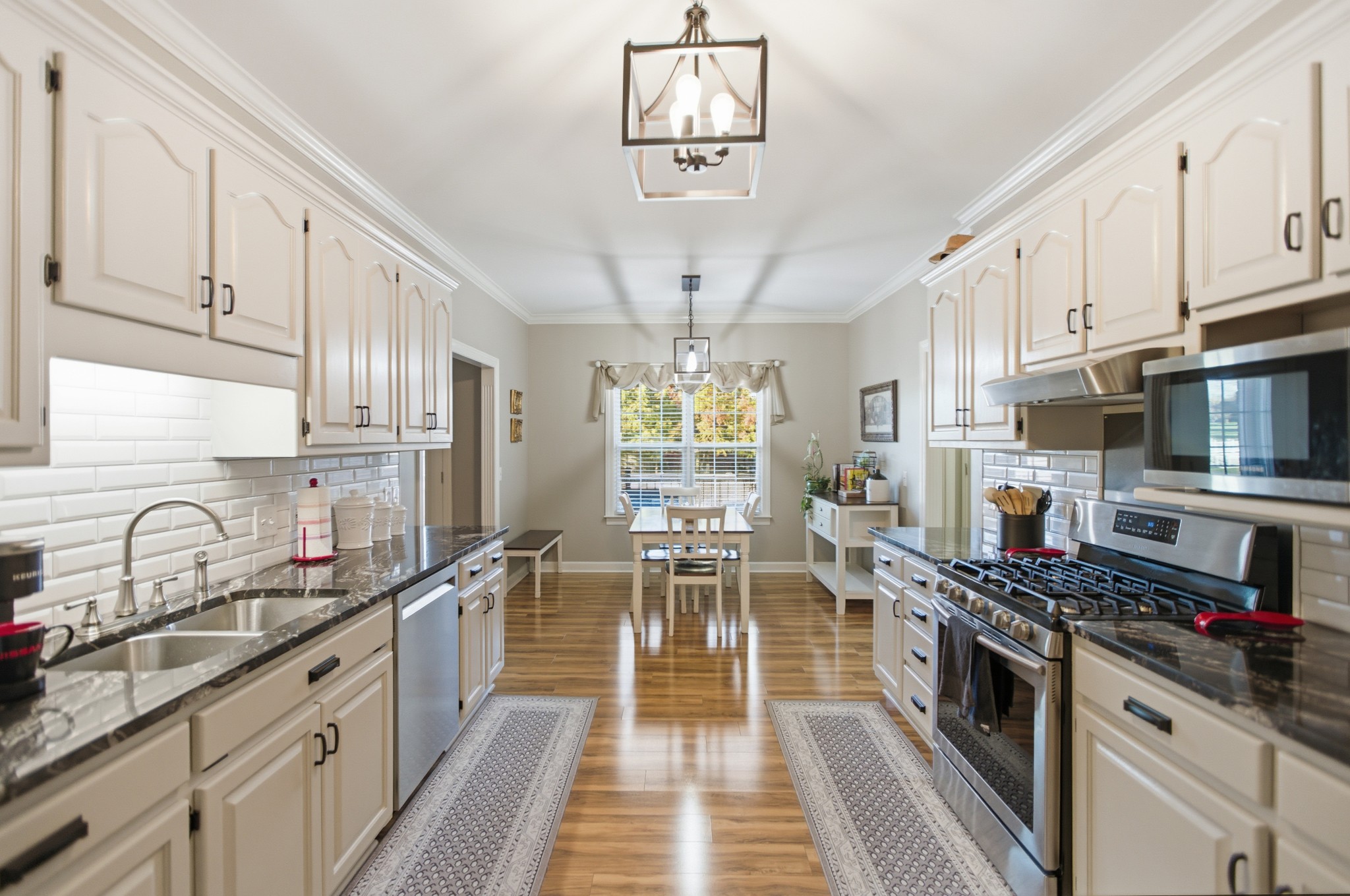 431 Ovoca Lake Road Tullahoma, TN 37388 - Photo 11 of 58 a kitchen with stainless steel appliances a stove cabinets and a sink