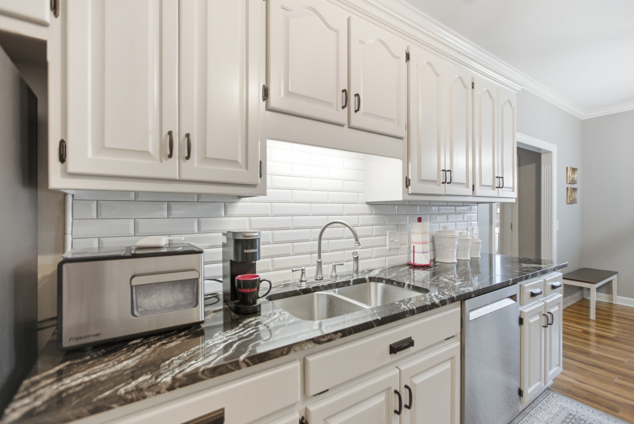 431 Ovoca Lake Road Tullahoma, TN 37388 - Photo 12 of 58 a kitchen with granite countertop a sink stainless steel appliances and cabinets