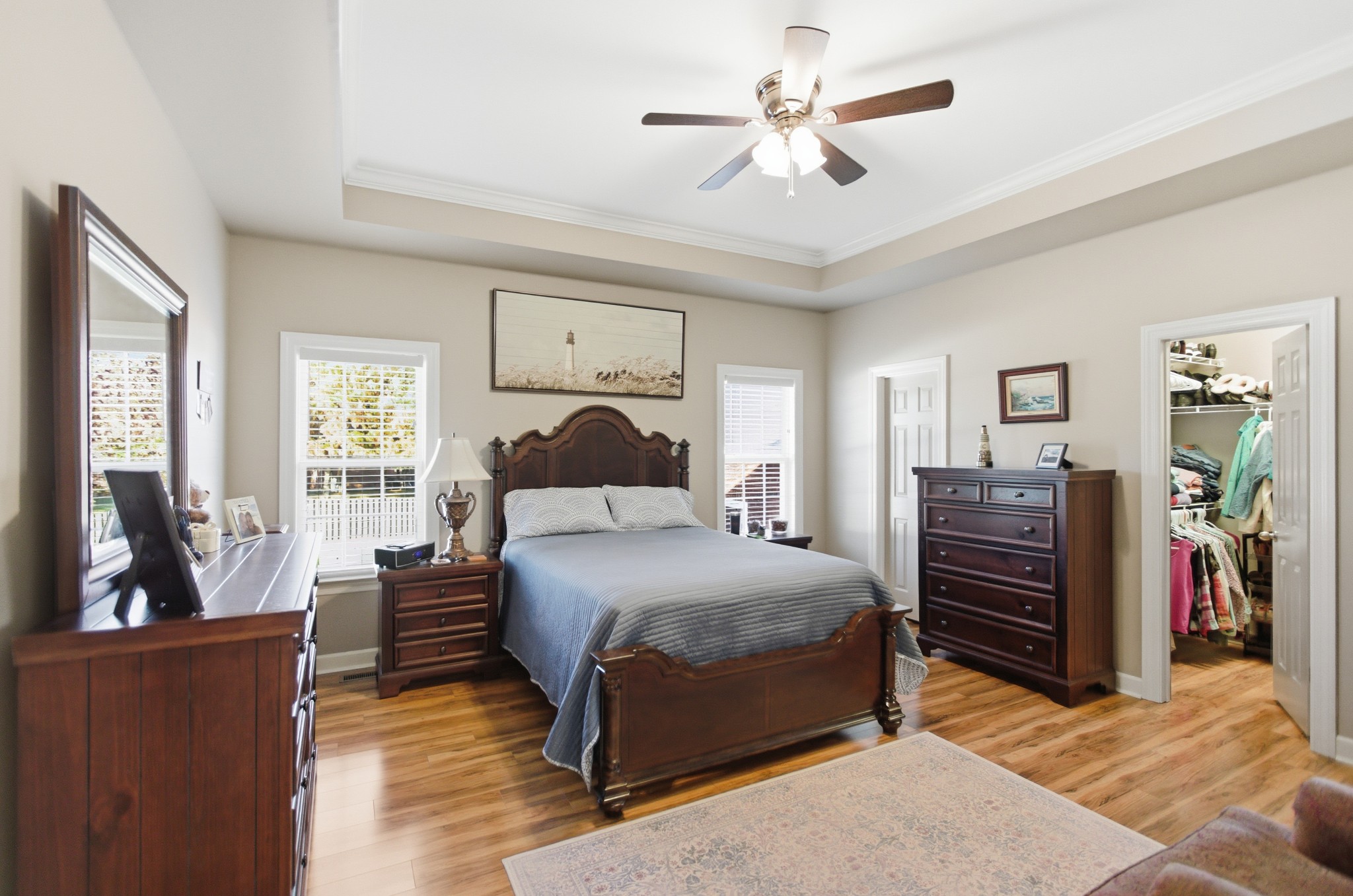 431 Ovoca Lake Road Tullahoma, TN 37388 - Photo 18 of 58 a bedroom with a bed and a chandelier