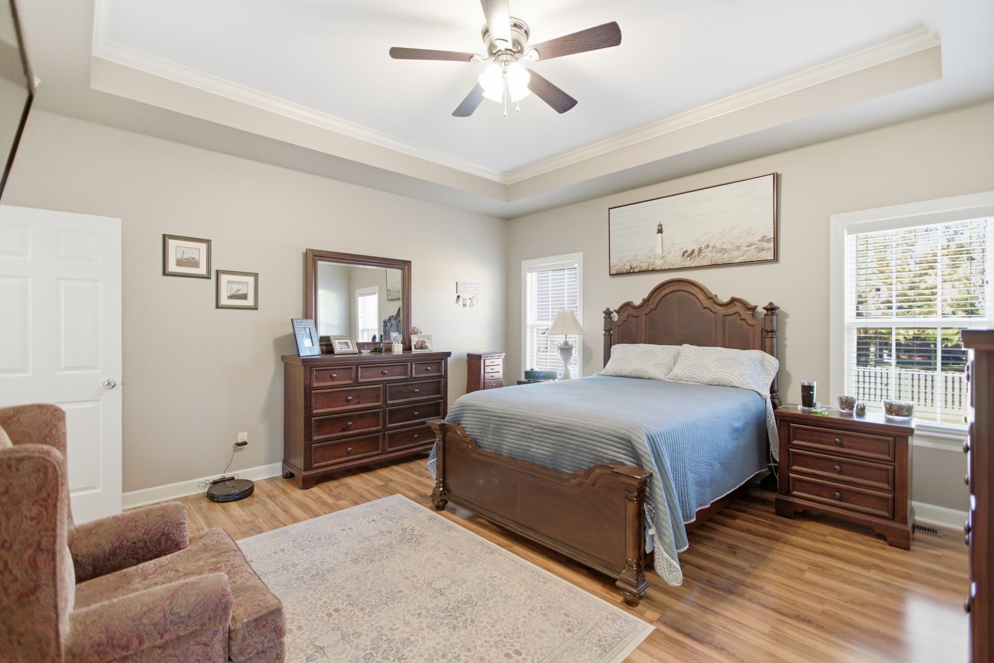 431 Ovoca Lake Road Tullahoma, TN 37388 - Photo 19 of 58 a bedroom with a bed and wooden floor