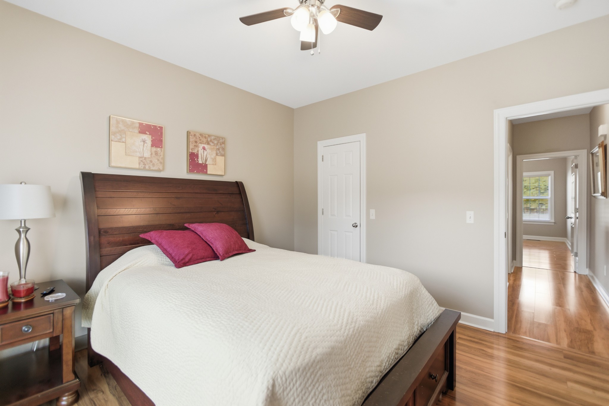 431 Ovoca Lake Road Tullahoma, TN 37388 - Photo 23 of 58 a bedroom with a bed and a chandelier