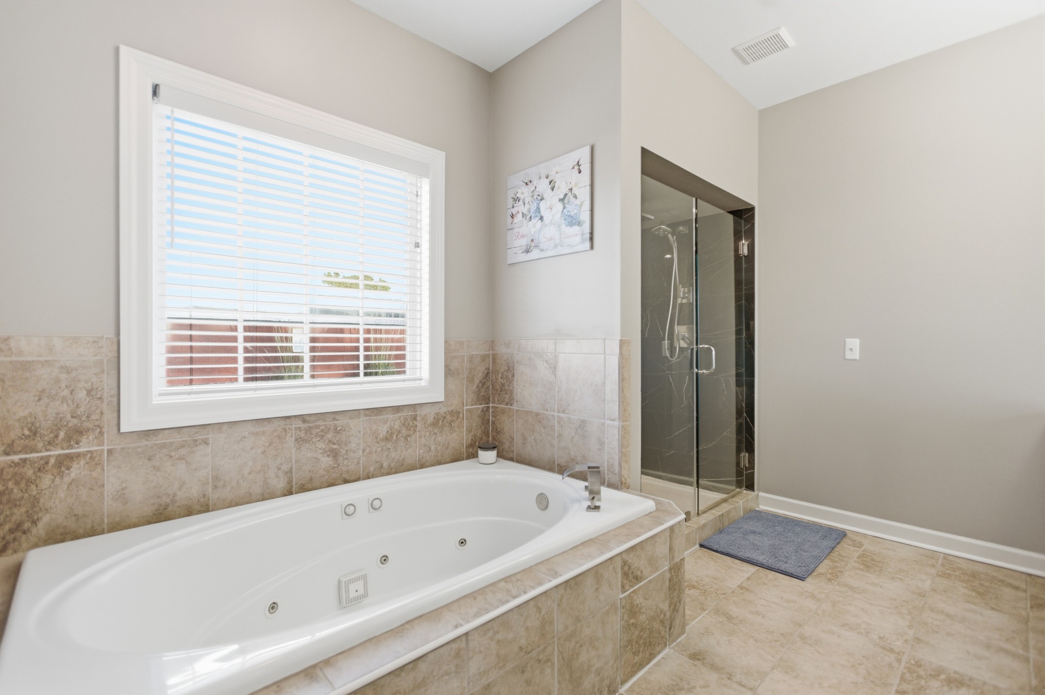 431 Ovoca Lake Road Tullahoma, TN 37388 - Photo 25 of 58 a bathroom with a bathtub and a shower