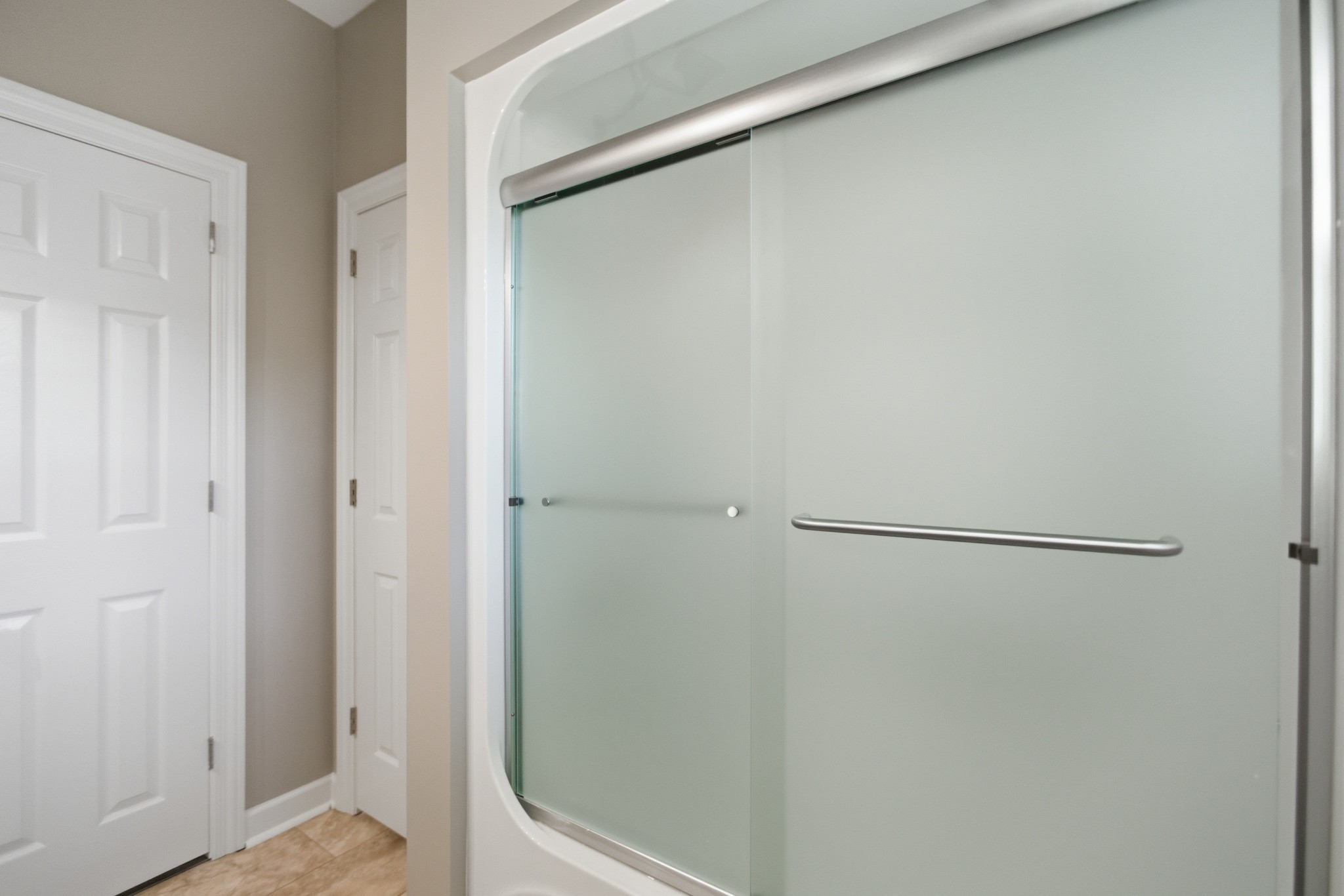 431 Ovoca Lake Road Tullahoma, TN 37388 - Photo 34 of 58 a bathroom with a glass shower door