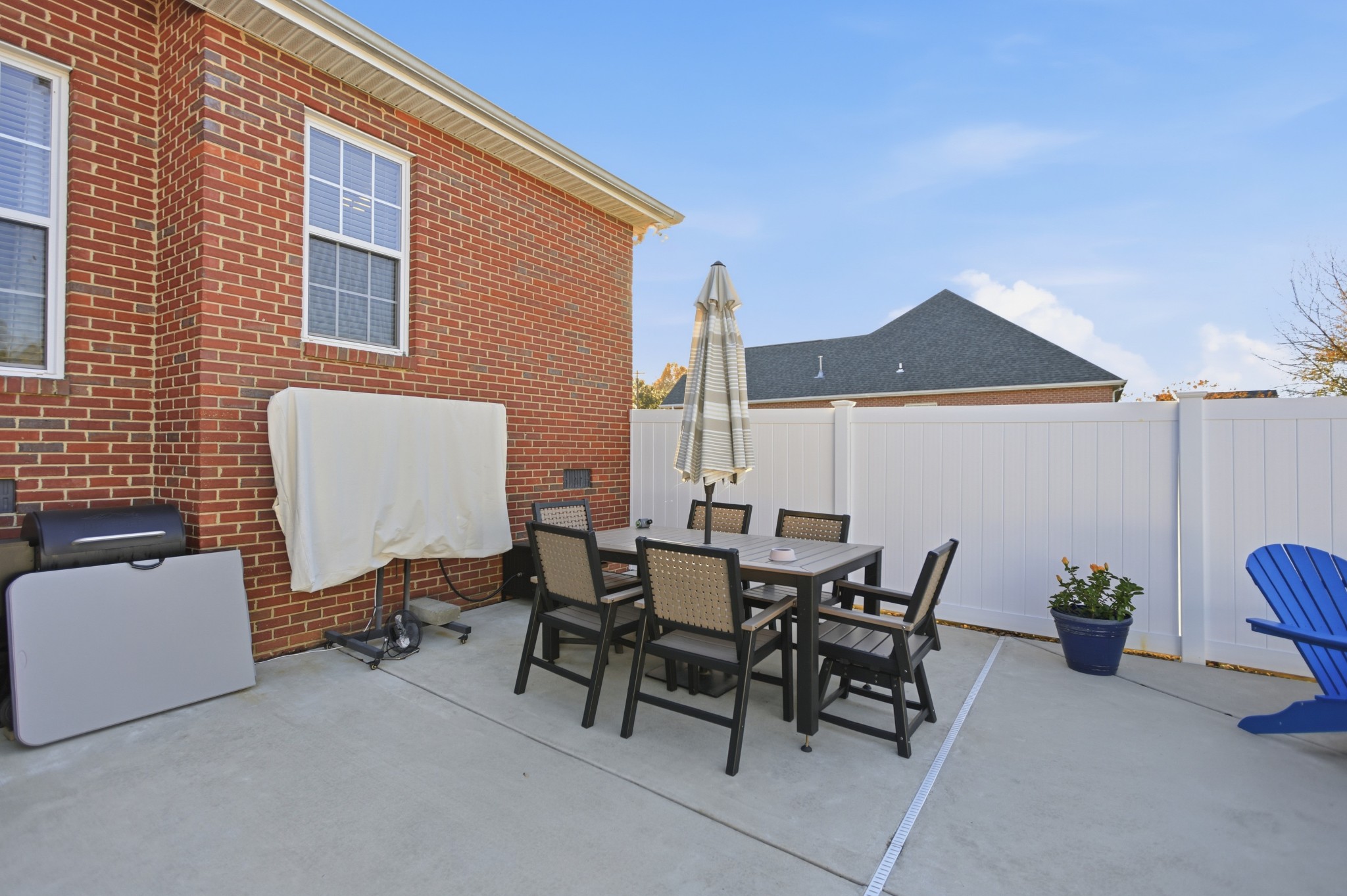 431 Ovoca Lake Road Tullahoma, TN 37388 - Photo 48 of 58 a view of a patio with table and chairs and potted plants