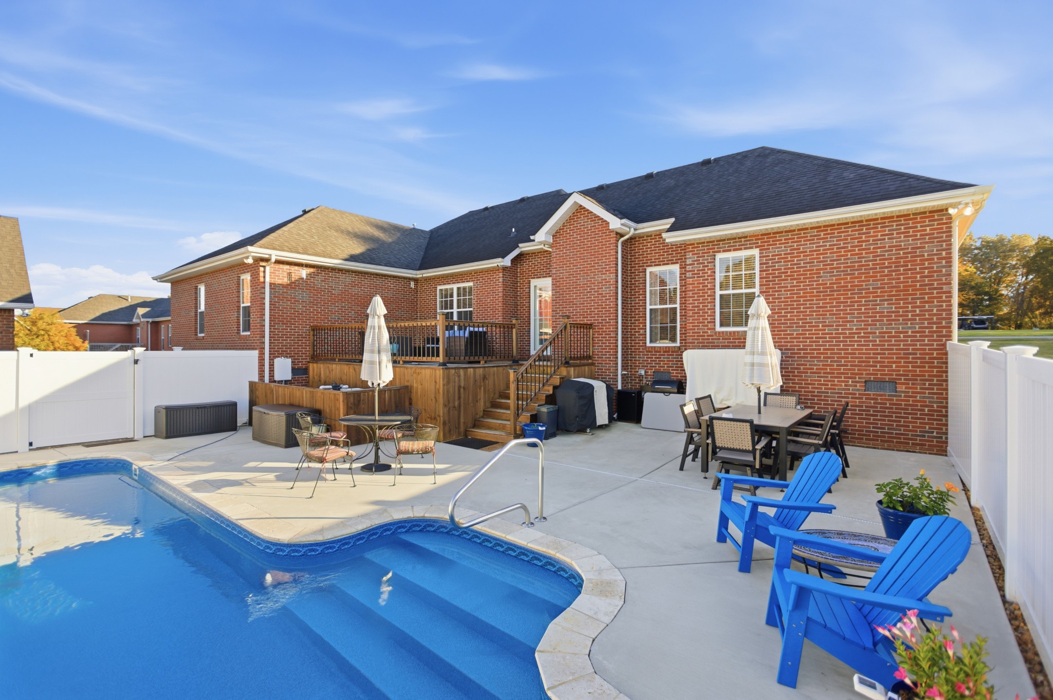 431 Ovoca Lake Road Tullahoma, TN 37388 - Photo 51 of 58 a living room with patio furniture and kitchen view