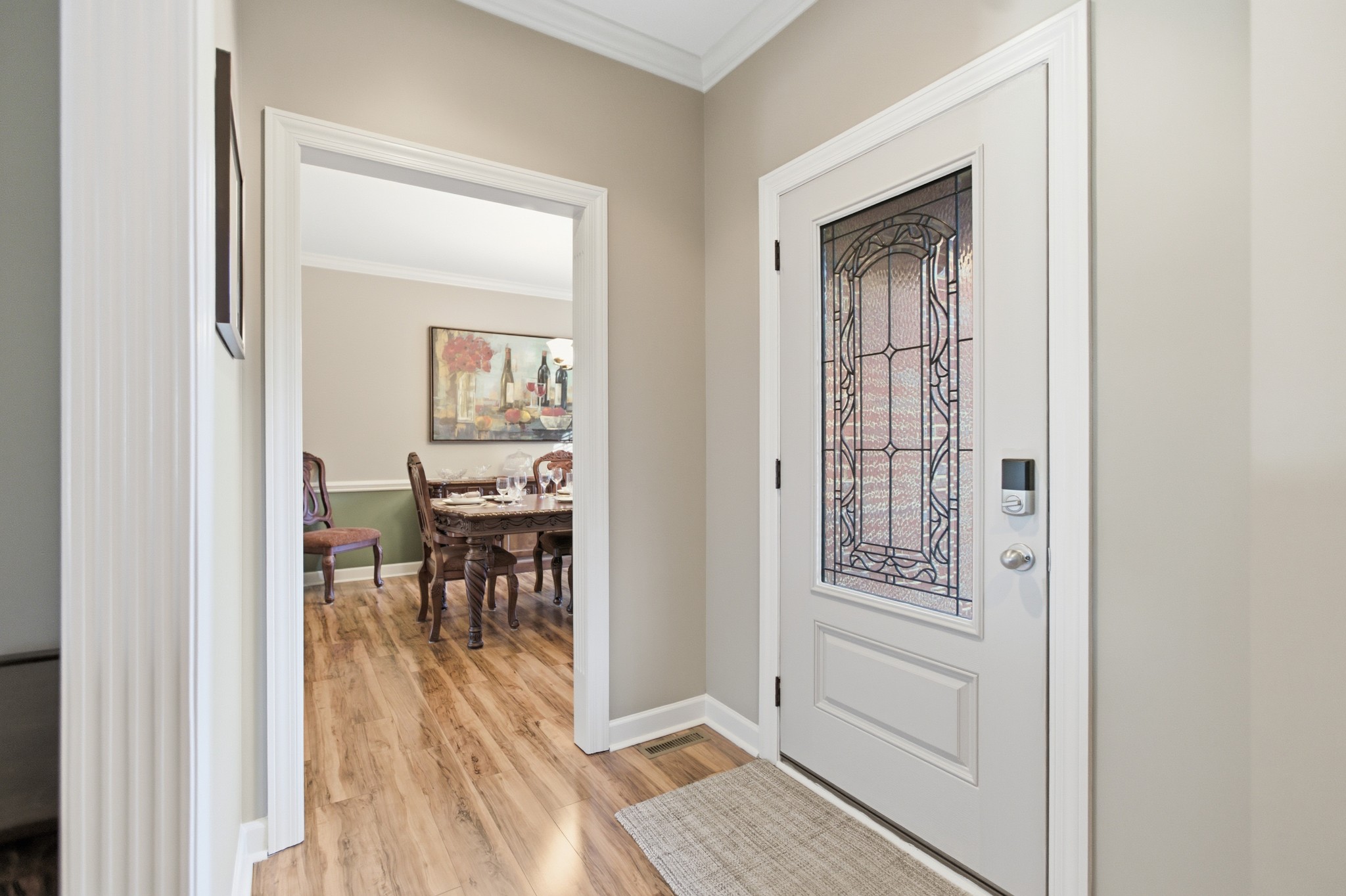 431 Ovoca Lake Road Tullahoma, TN 37388 - Photo 6 of 58 a view of a hallway with dining room and wooden floor